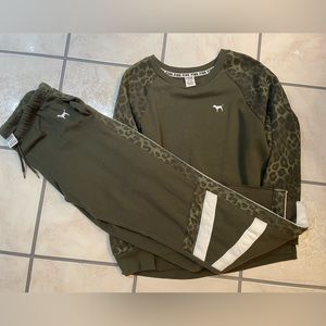 Pink sweat suit. Barley worn. Size medium pants Lg shirt.